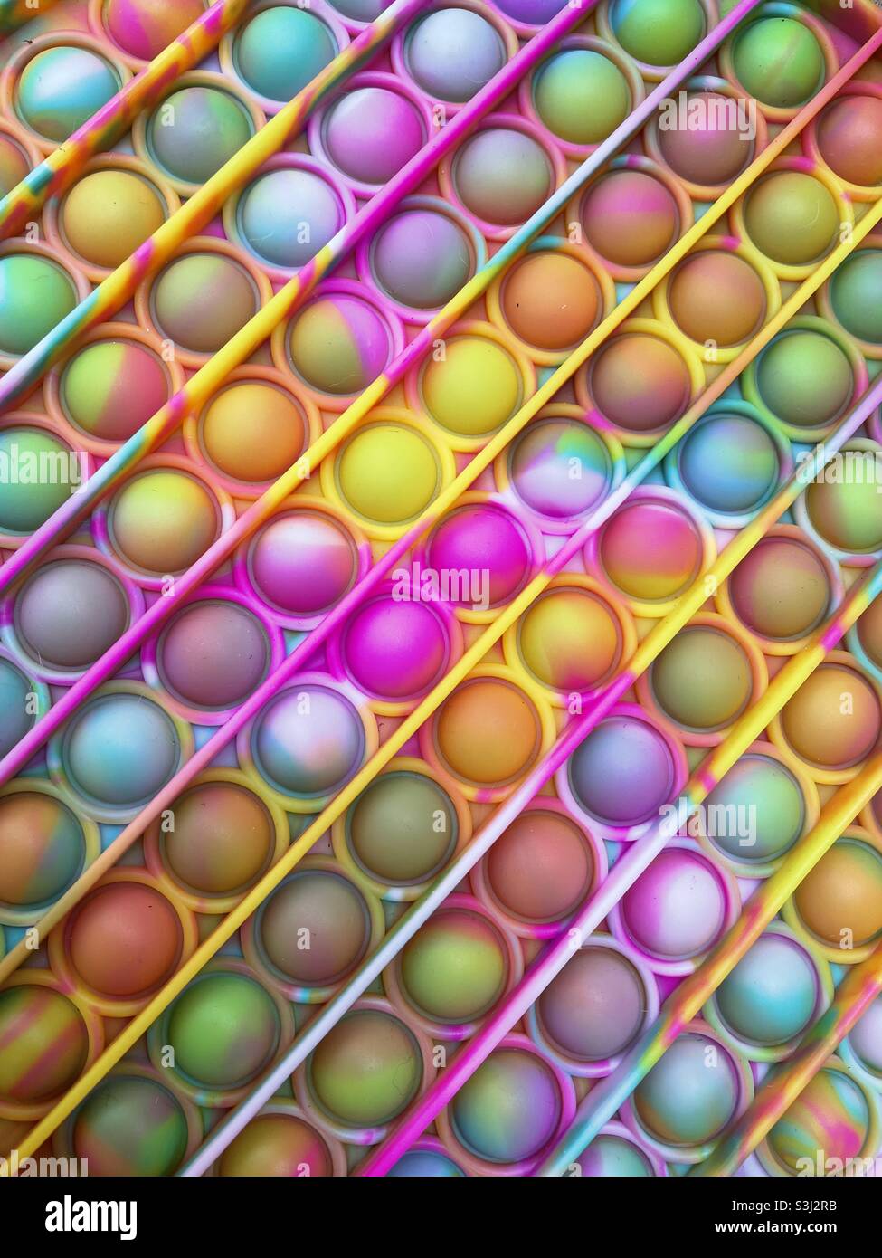 Abstract background of popular pop it toy for children Stock Photo