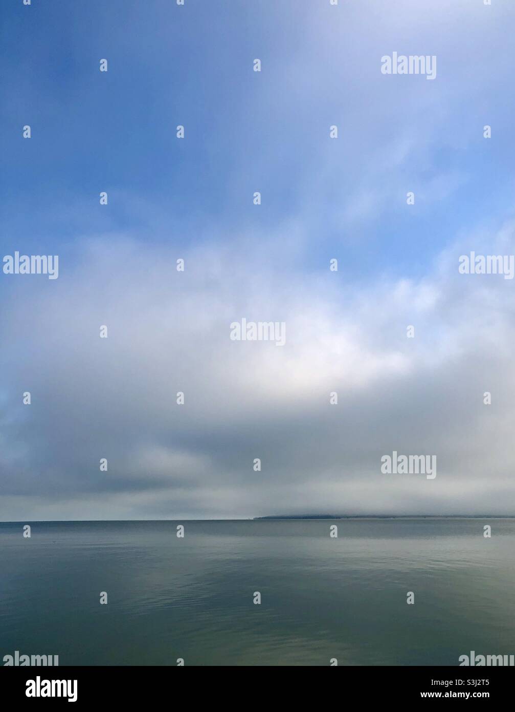 Clouds and horizon over water - Smartphone Captured Stock Image