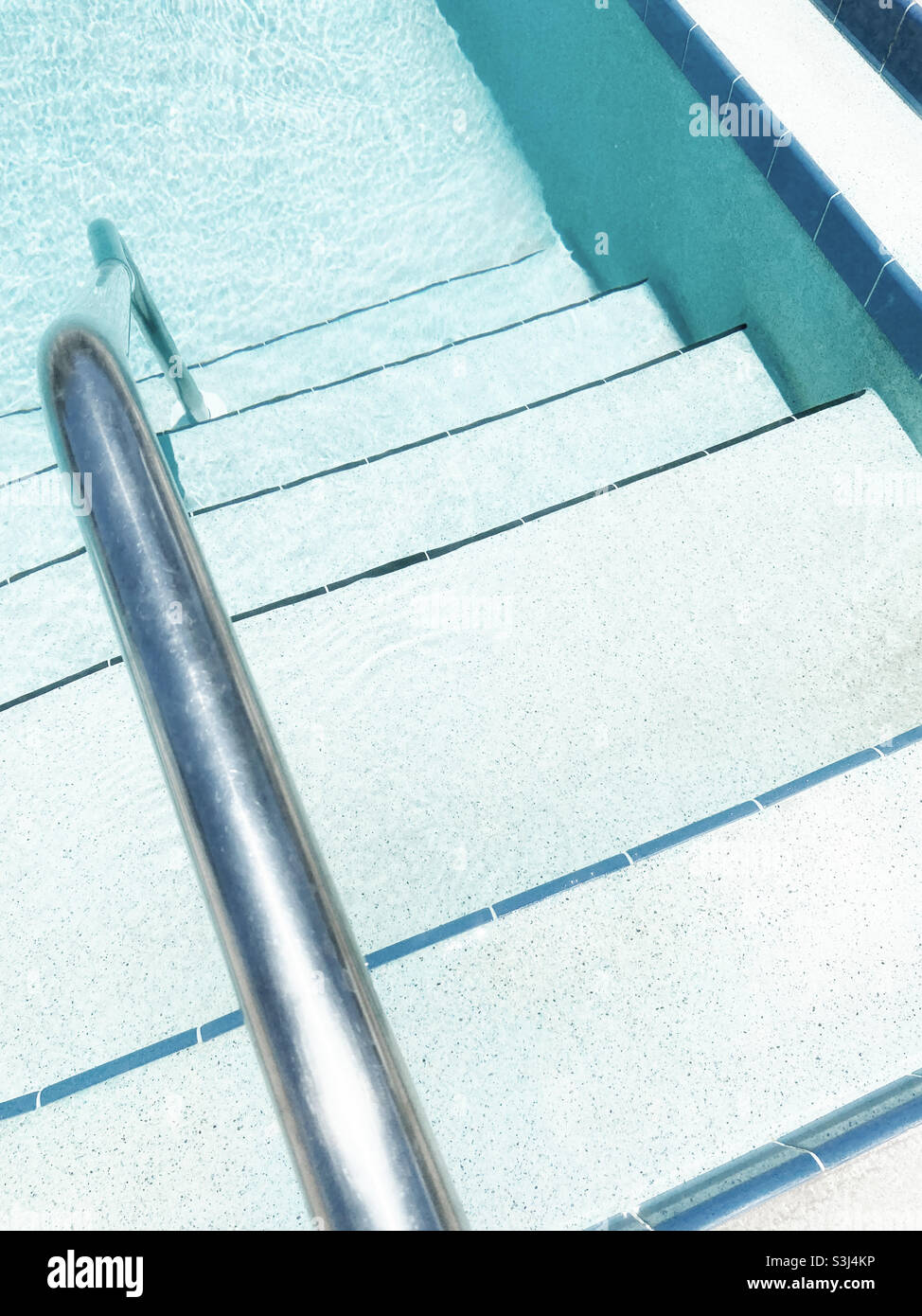 Pool steps and hand rail - Smartphone Captured Stock Image