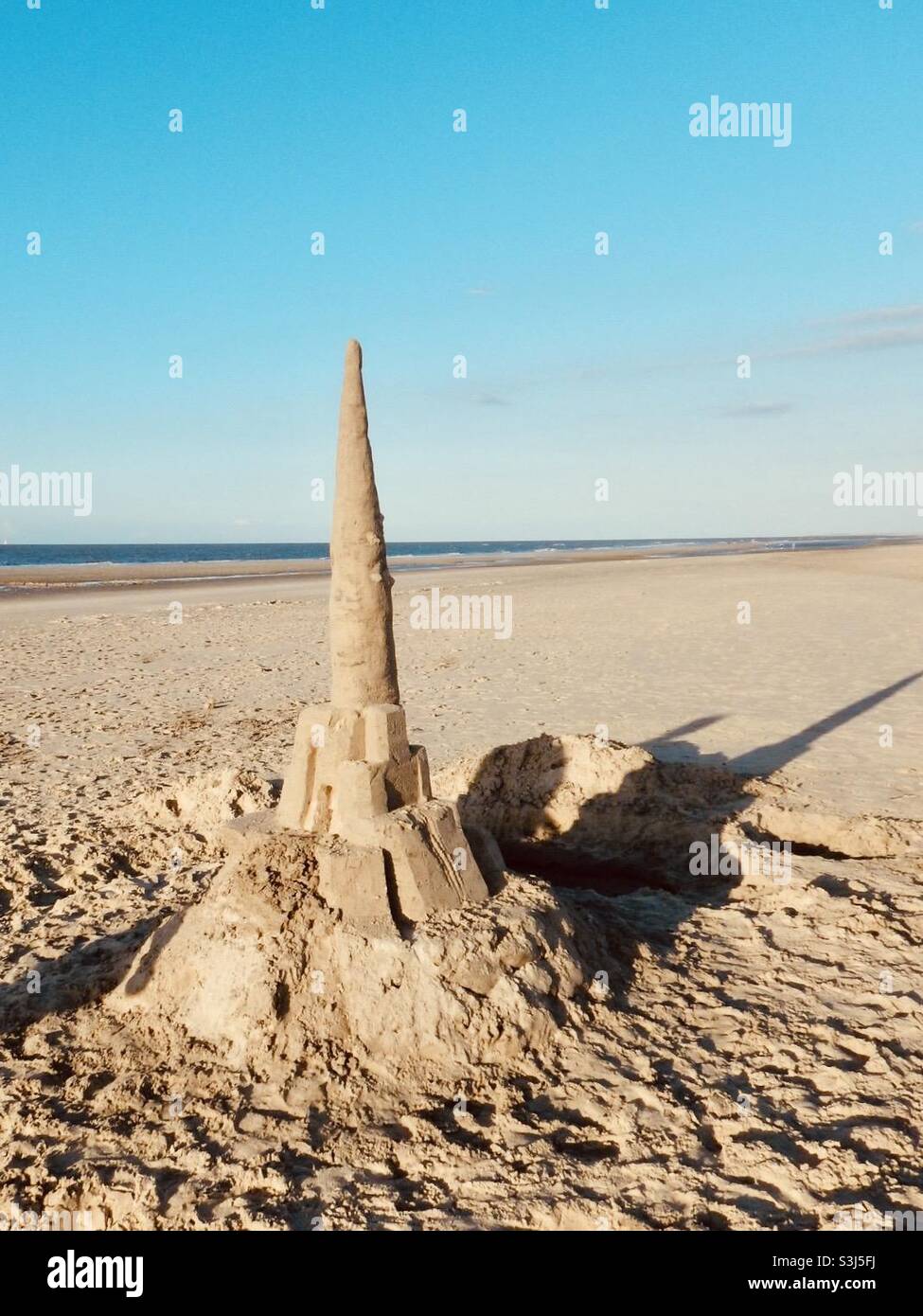 sand castle on the beach - Smartphone Captured Stock Image