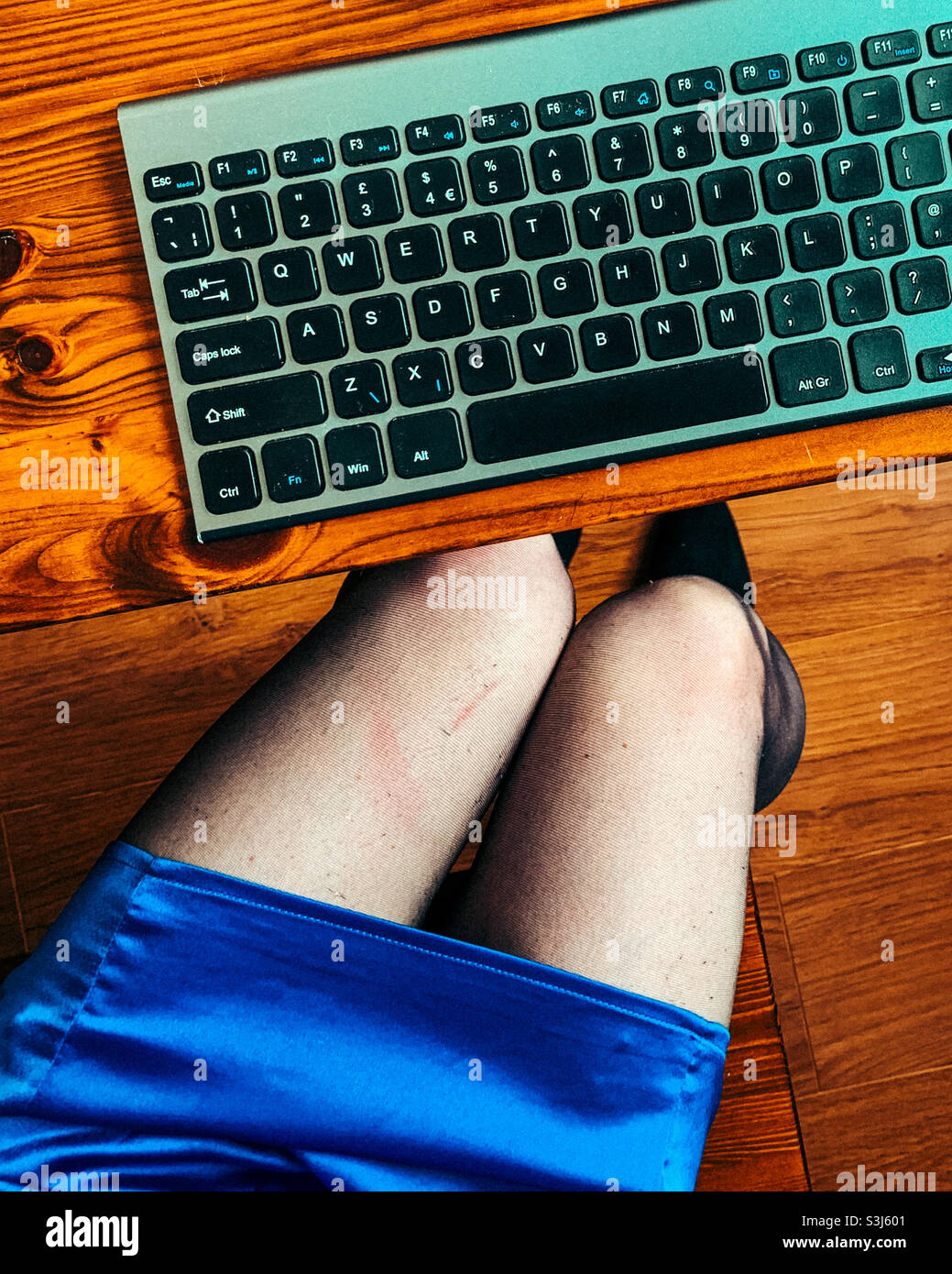 Woman working from home - Smartphone Captured Stock Image