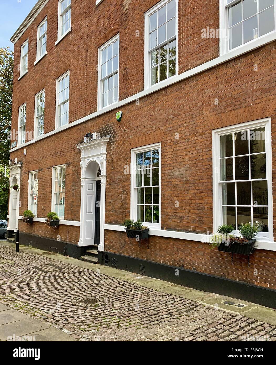 Elegant Georgian town houses of 1788 on historic Castle Gate, Nottingham UK, near Nottingham Castle. Grade II listed buildings, they were converted and the interior re-designed c1970. Stock Photo