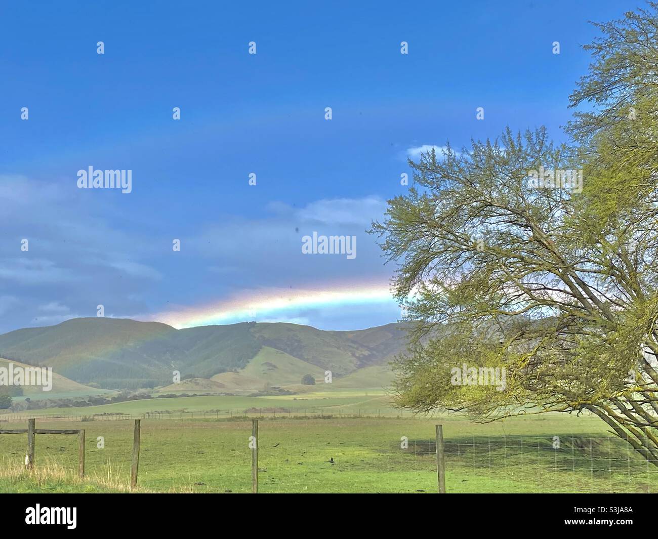 A Rainbow in North Canterbury,New Zealand Stock Photo