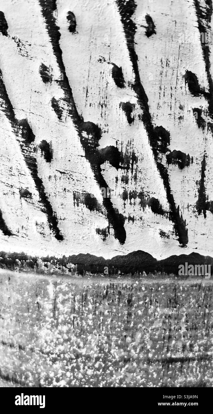 A striped dark pattern on a white surface close up - Smartphone Captured Stock Image