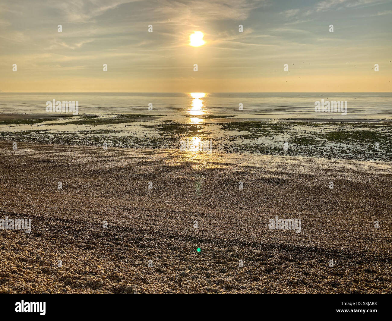 Autumn sunrise over the sea at Sovereign Harbour, Pevensey, Eastbourne in September Stock Photo