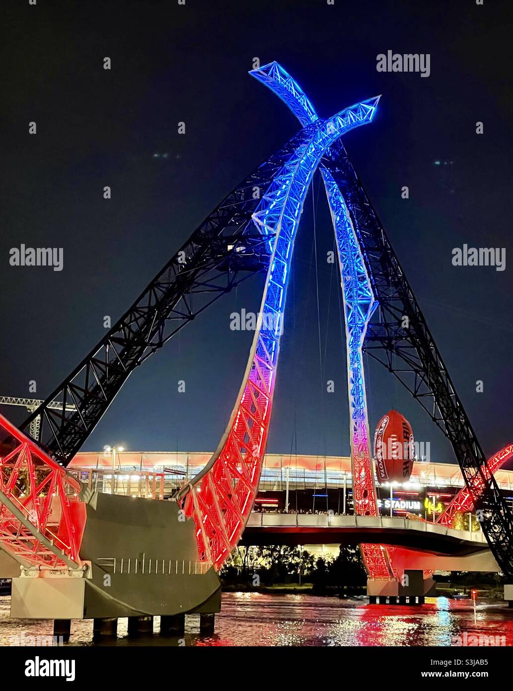 Matagarup Bridge lit up in Melbourne Football Club colours red and blue after winning the 2021 AFL Grand Final at Optus Stadium Perth Western Australia Stock Photo