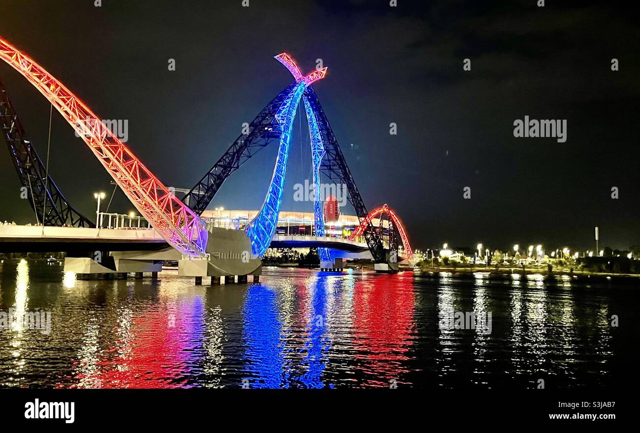 Matagarup Bridge lit up in Melbourne Football Club colours red and blue after winning the 2021 AFL Grand Final at Optus Stadium Perth Western Australia Stock Photo