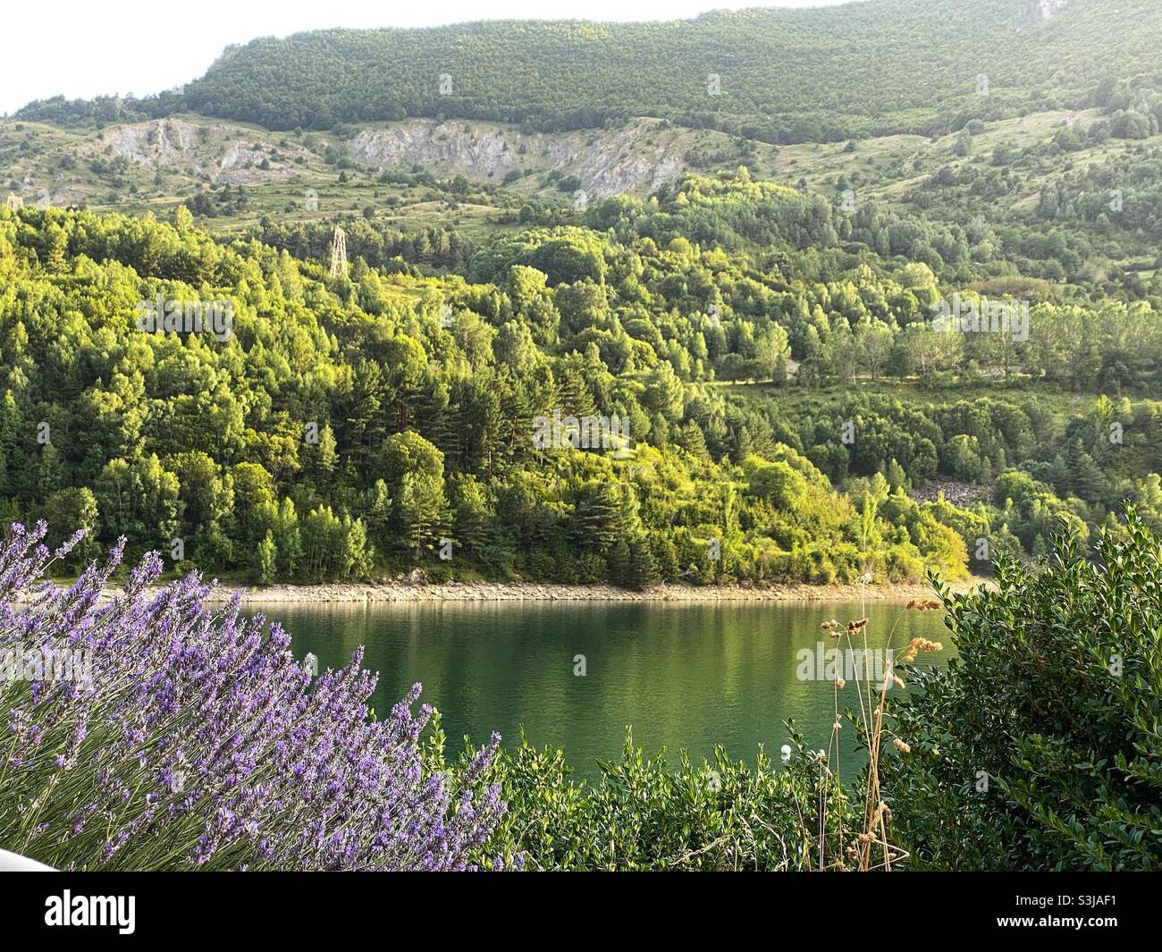 Mountain landscape by a reservoir Stock Photo