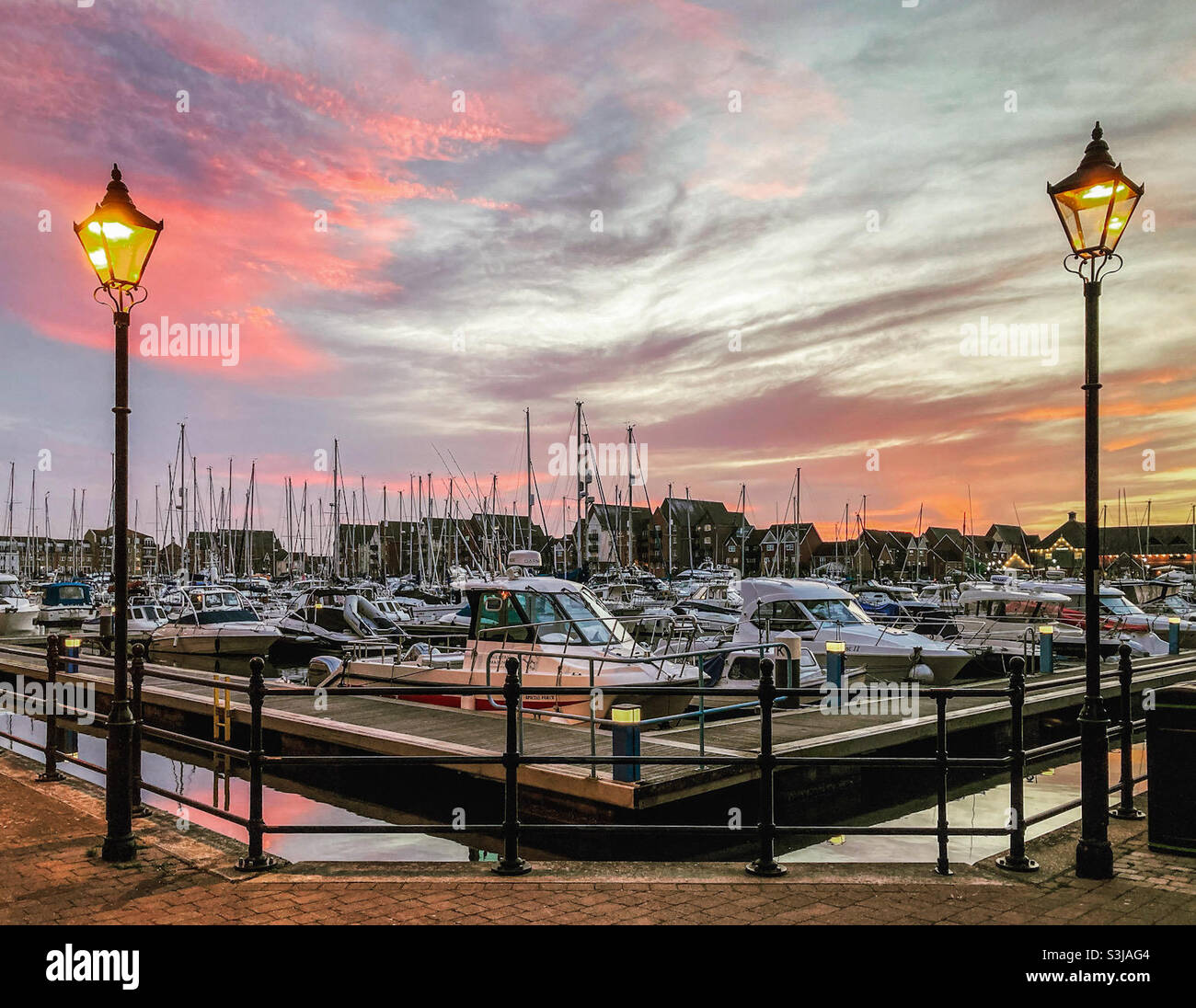 Autumn sunset at Sovereign Harbour after a glorious, sunny, September day - Smartphone Captured Stock Image