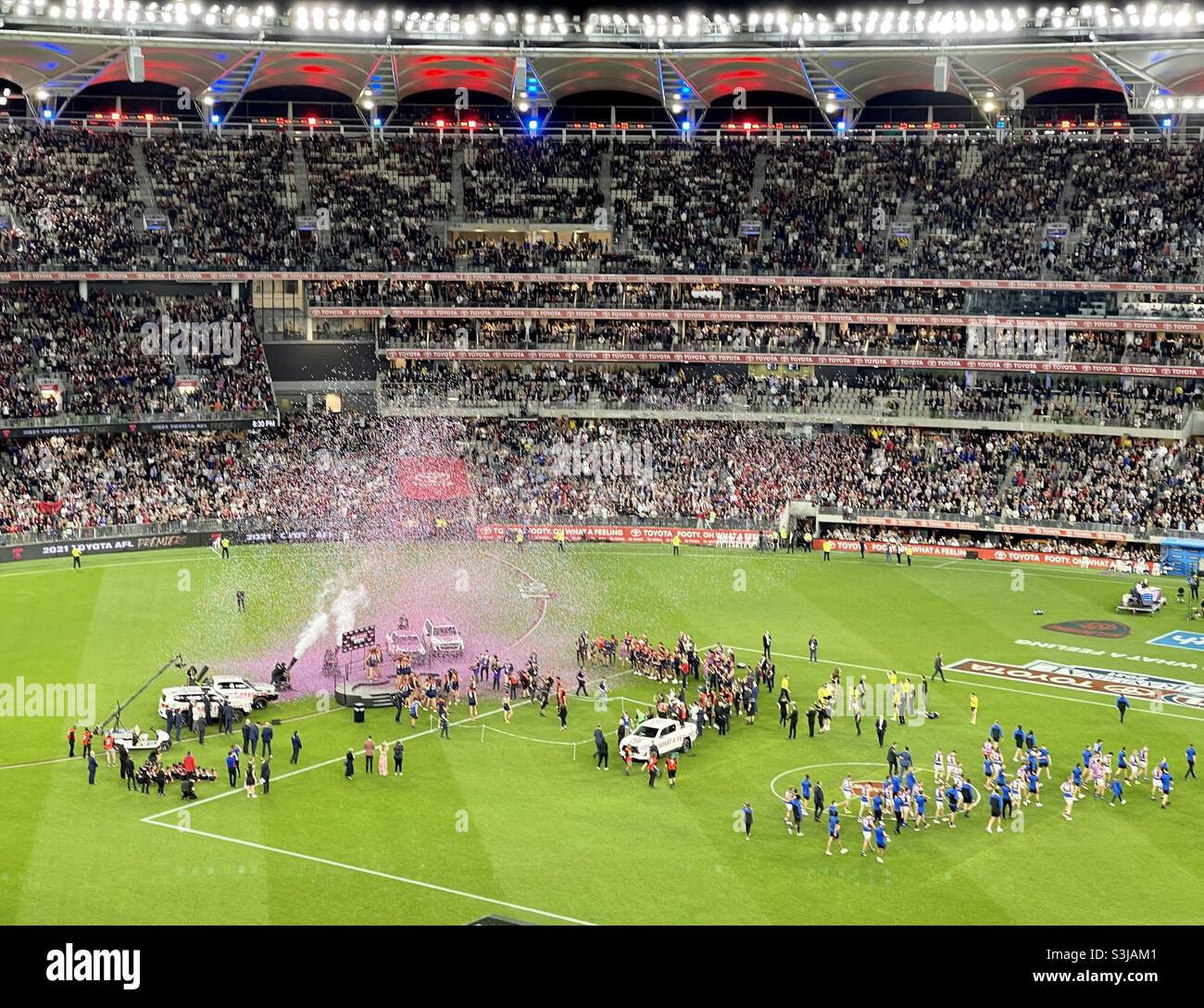 Confetti blowing over the Premiership team Melbourne Football Club winning the 2021 AFL Grand Final at Optus Stadium Perth Western Australia Stock Photo