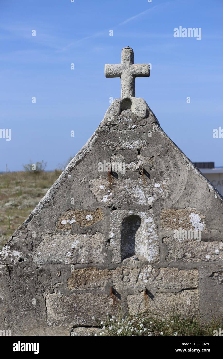 Old Calvary cross at the island of Hoedic in Brittany - Smartphone Captured Stock Image