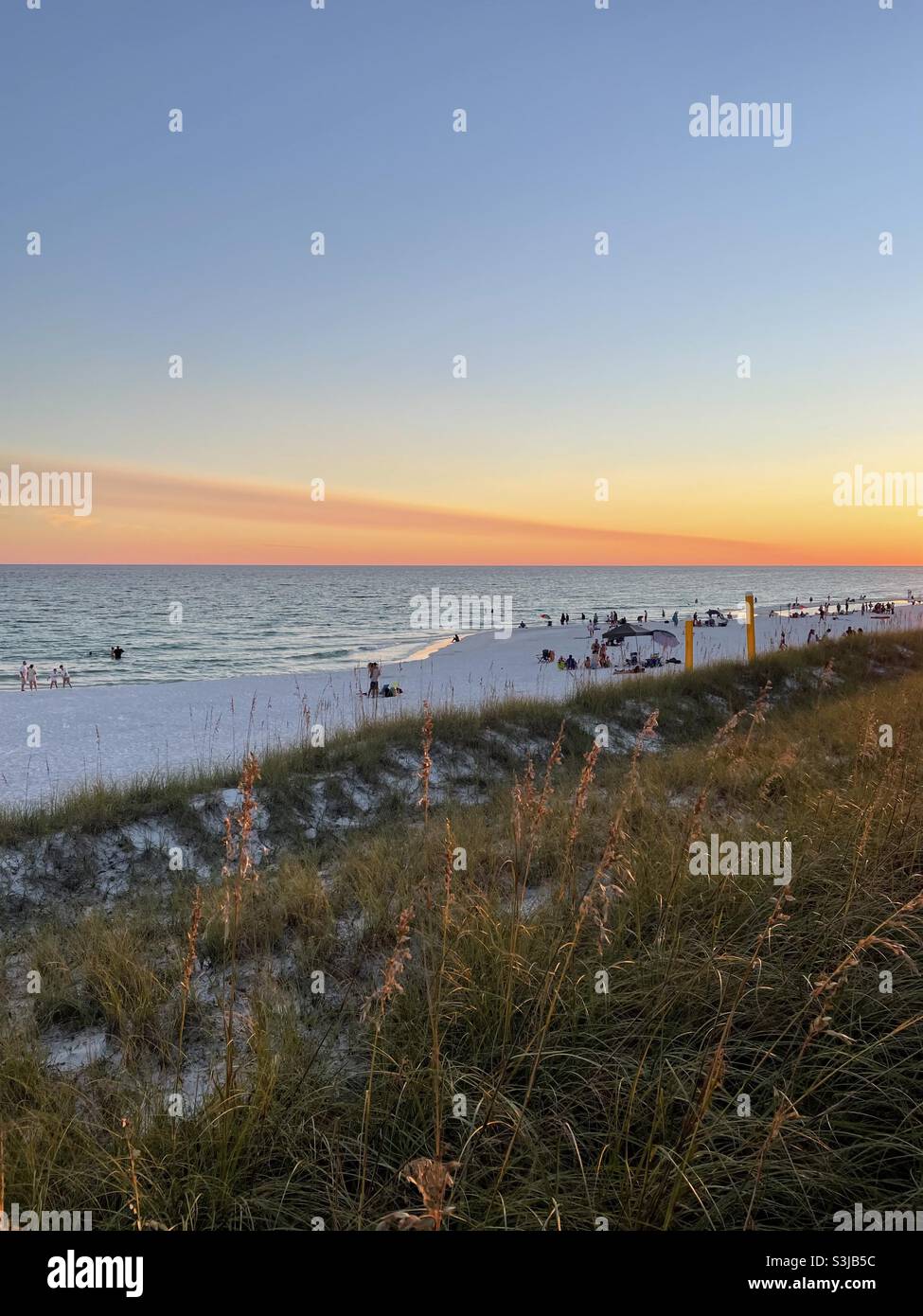 Upper view of sunset on Destin, Florida USA white sand beach Stock Photo