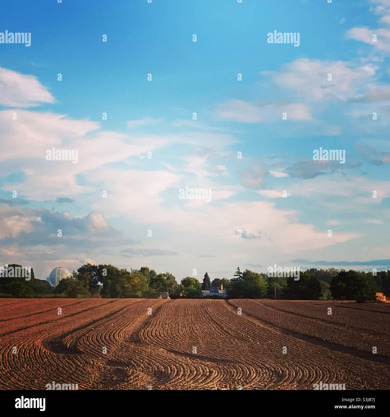 Ploughed field in Cheshire looking towards Jodrell Bank Stock Photo