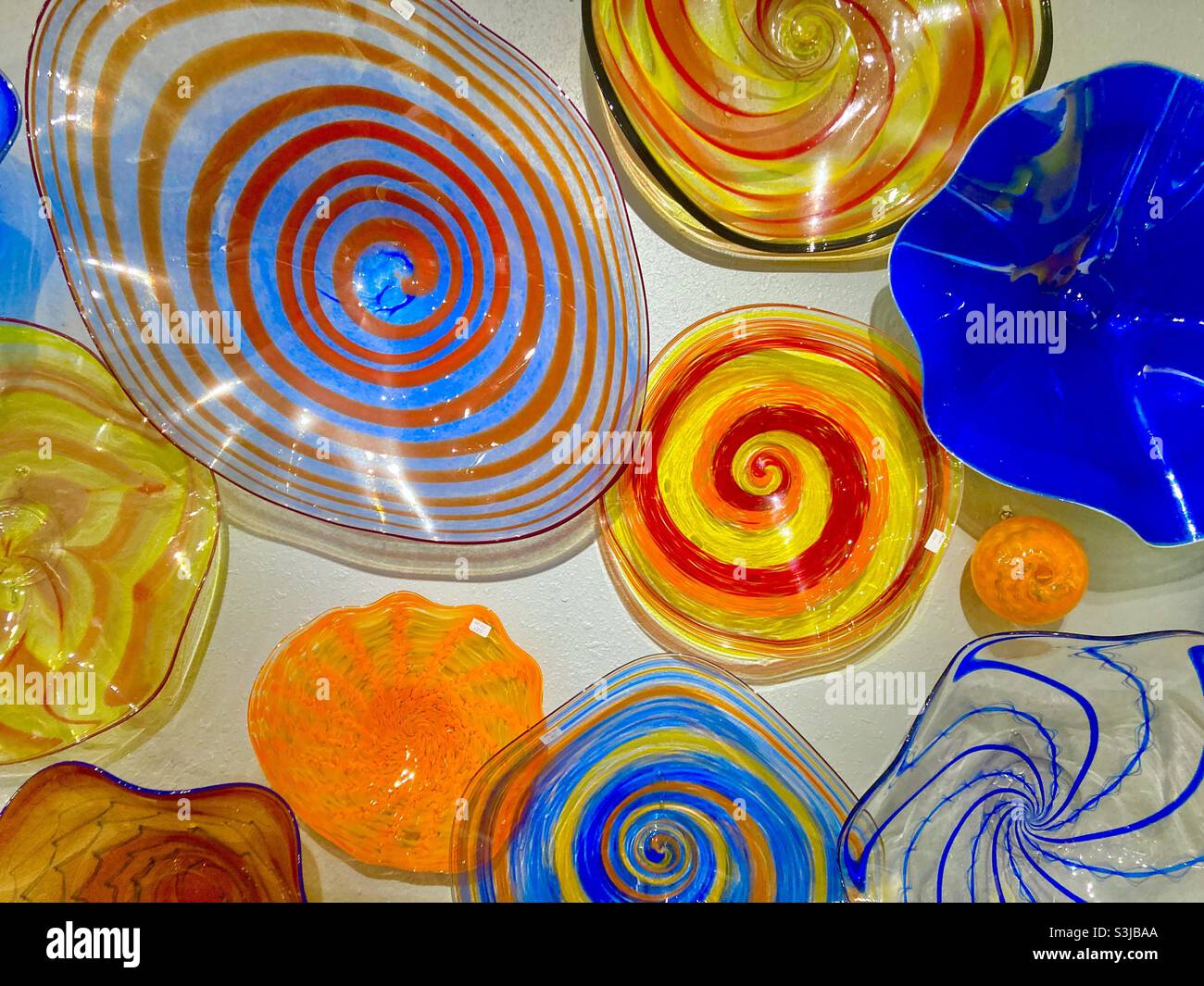 Hand blown glass floating on the wall - Smartphone Captured Stock Image