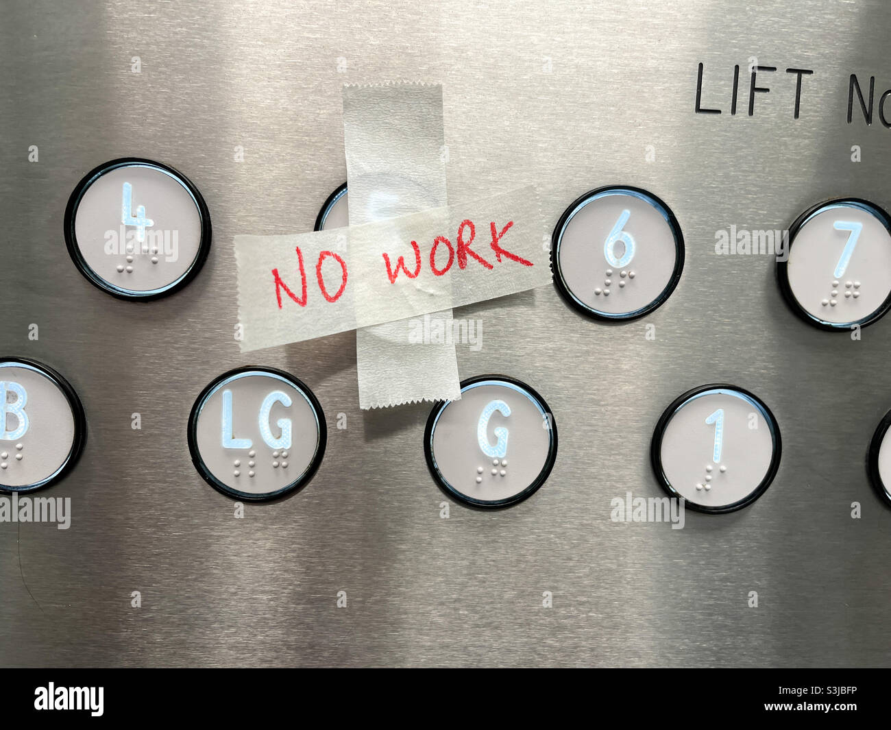 No work sign on elevator buttons. - Smartphone Captured Stock Image