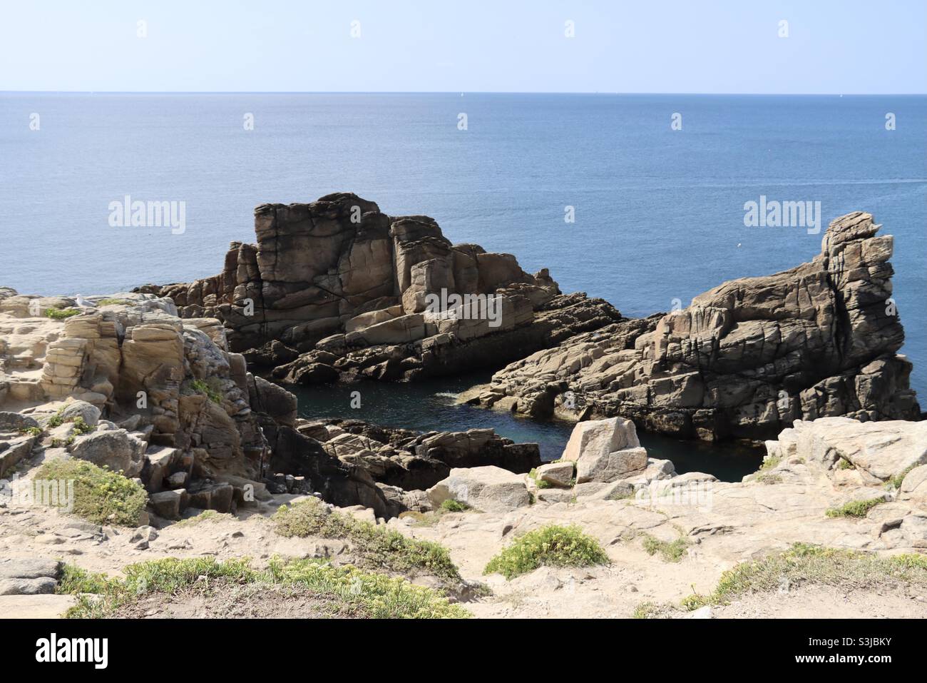 Some rocks at the wild coast of Quiberon in Brittany , France - Smartphone Captured Stock Image