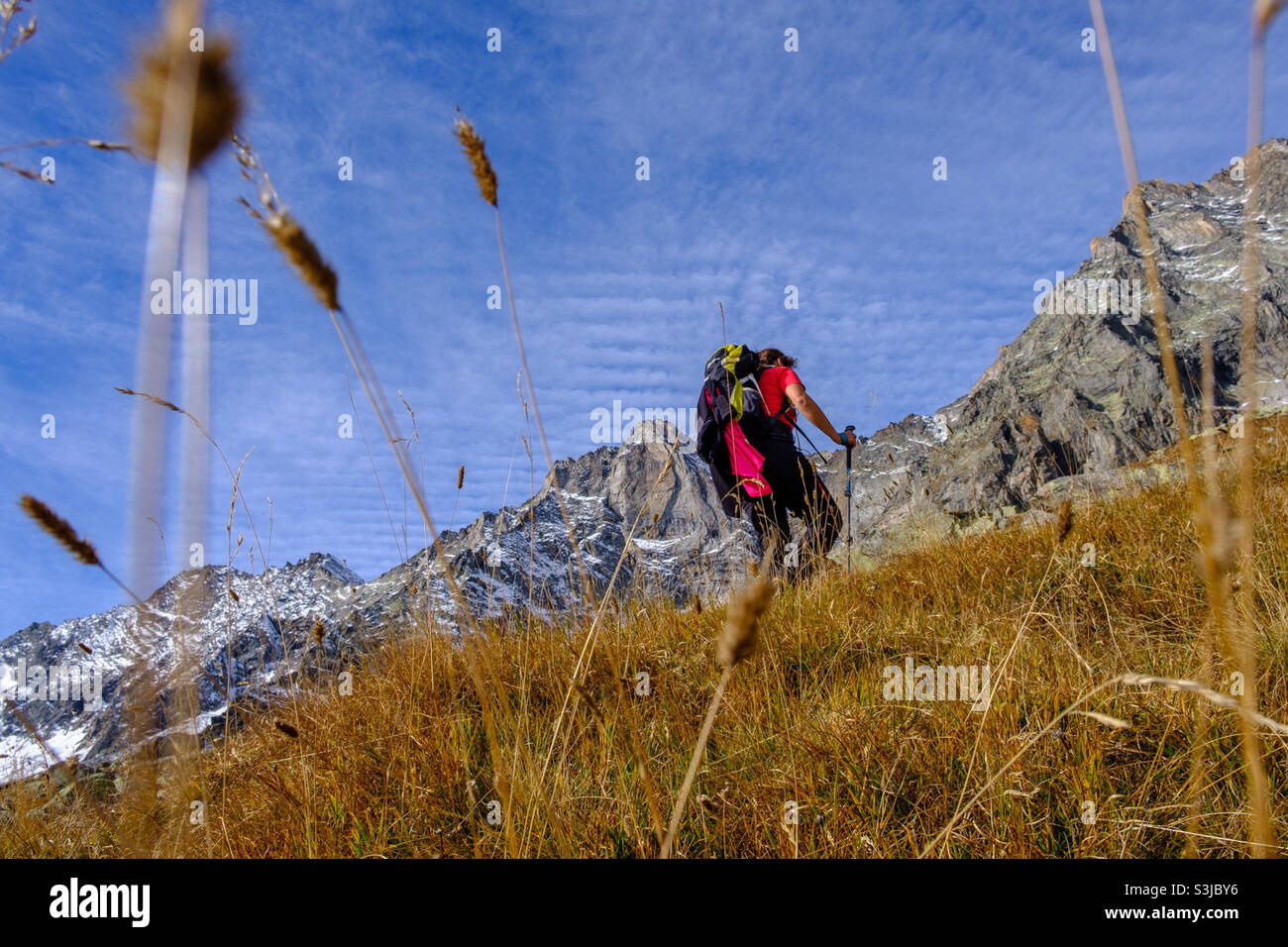 Woman Climbing a mountain - Smartphone Captured Stock Image