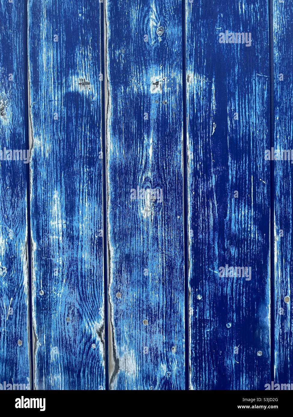 Washed and faded blue wooden planks. Stock Photo