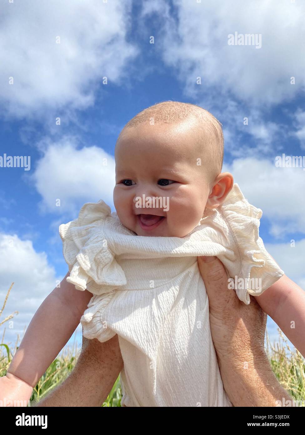 Baby with the clouds Stock Photo Alamy