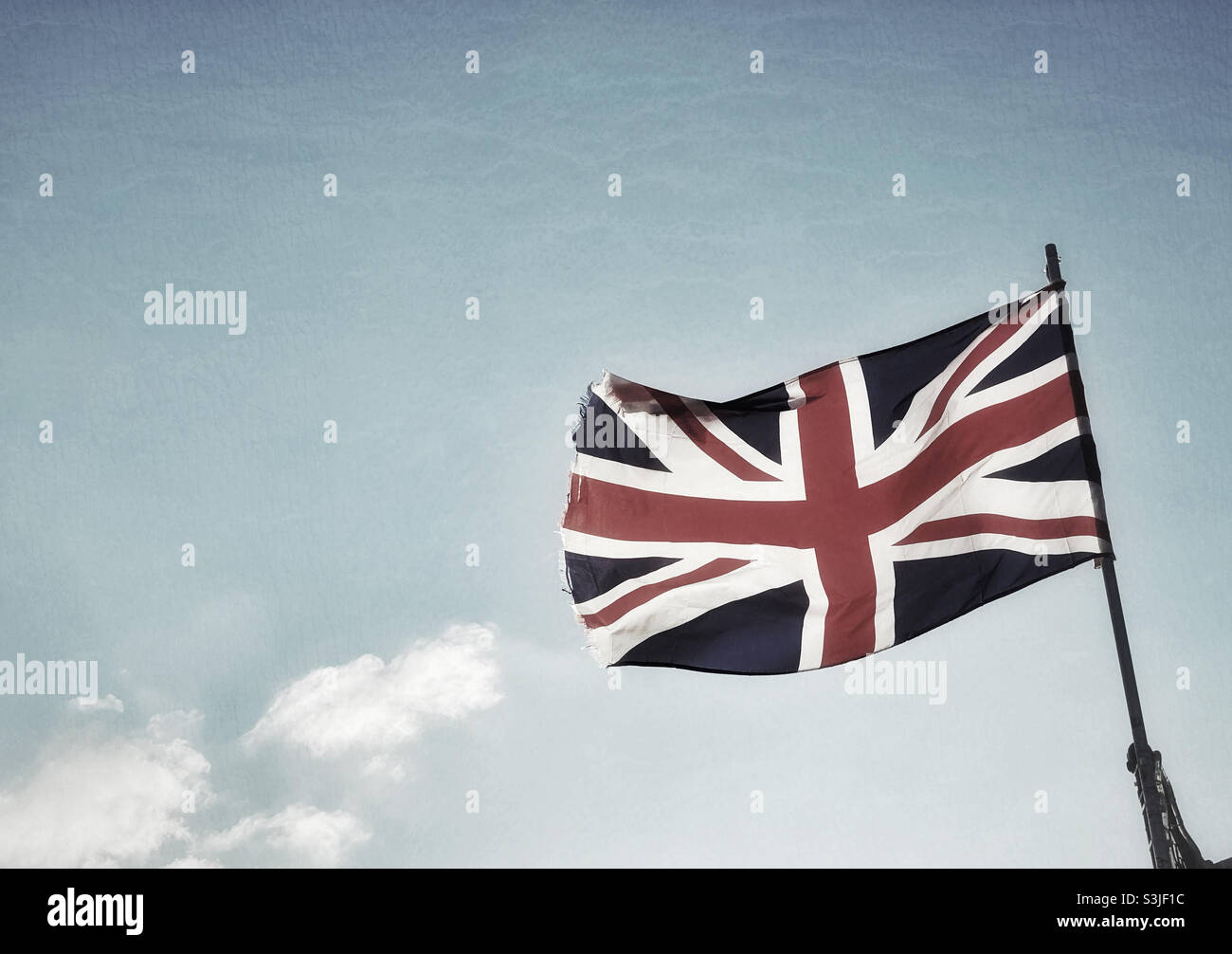 A desaturated Union Jack flag. A picture that might be a social comment on the state of the United Kingdom’s standing in the world. Brexit means the UK isn’t as strong as it once was? ©️ COLIN HOSKINS - Smartphone Captured Stock Image