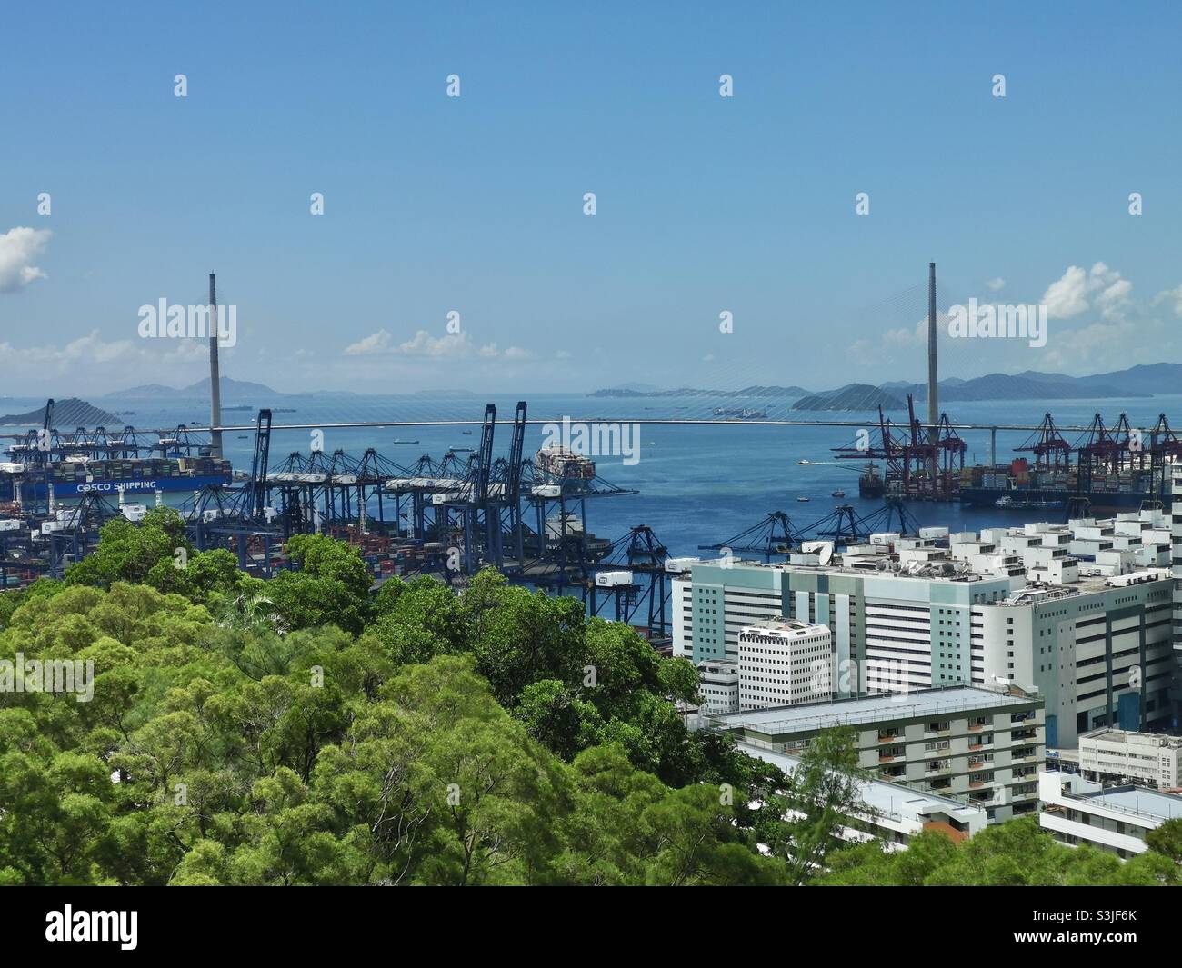 A view of the port of Hong Kong and stonecutter bridge Stock Photo - Alamy