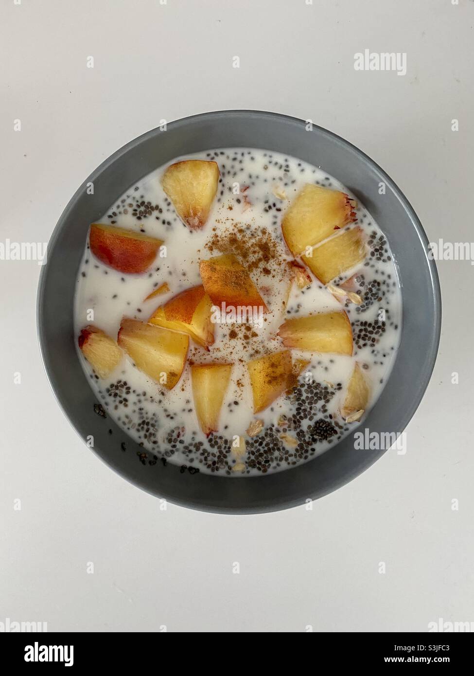 Chia seed, peach, cinnamon, milk, breakfast, oats Stock Photo Alamy