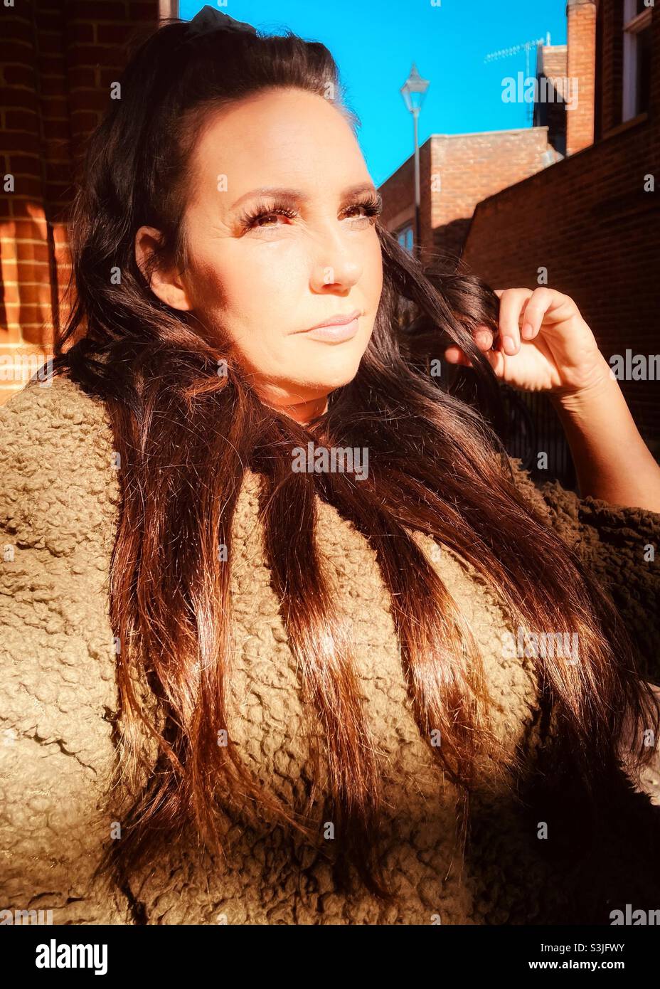 Woman with long brown hair - Smartphone Captured Stock Image