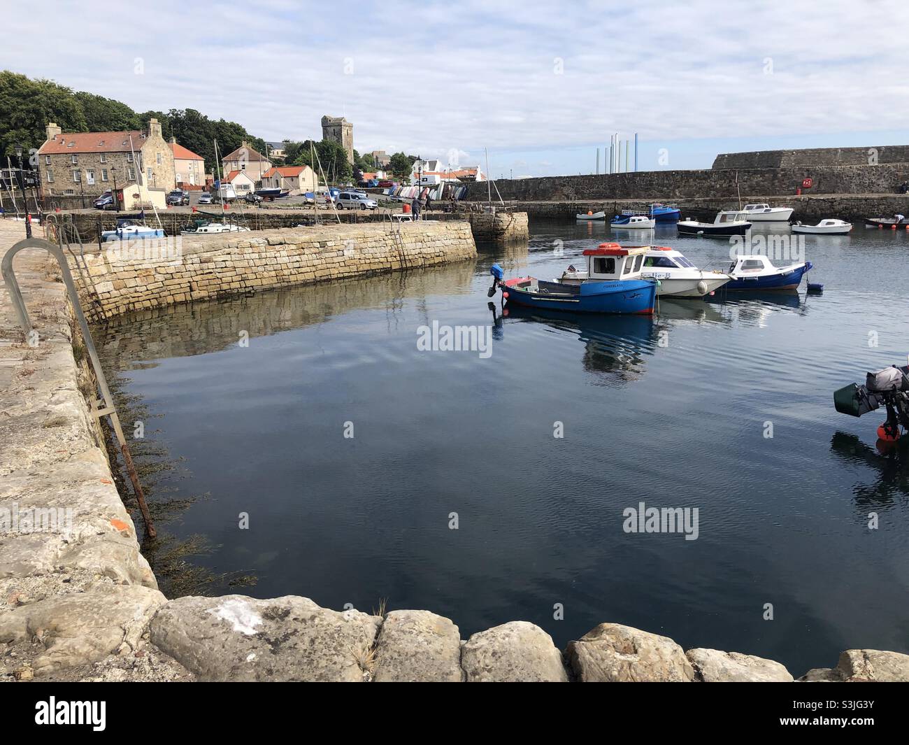 Fishing boats in Dysart Harbour, Fife, Scotland on a summer day Stock Photo