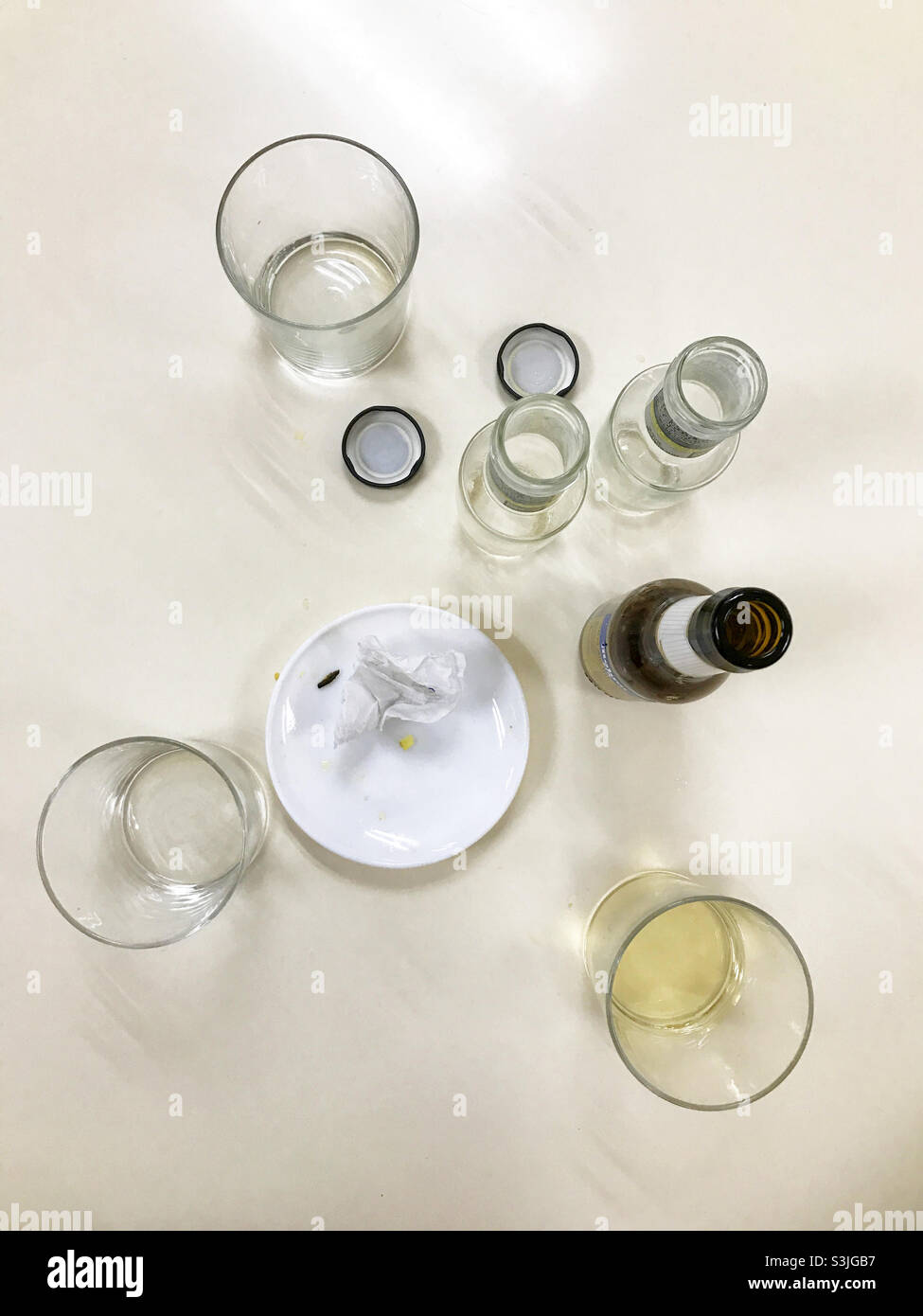 Bottles and glasses. View from above. - Smartphone Captured Stock Image