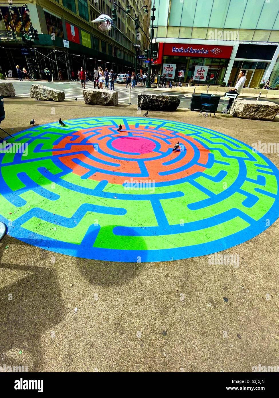Colorful sidewalk mandala in New York City Stock Photo