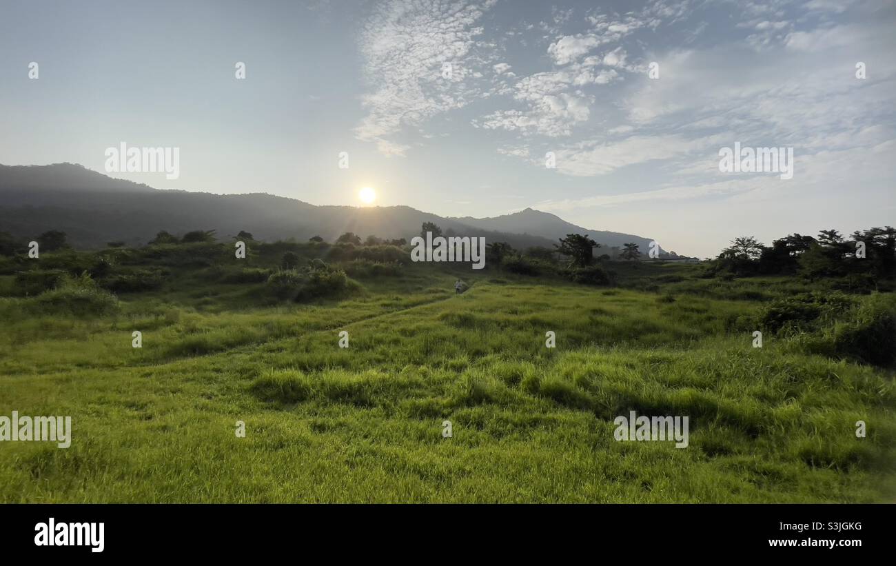 Clear mountain, green grass, fresh air Stock Photo