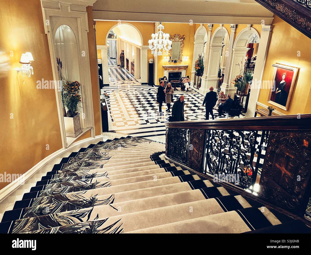 Staircase leading down to Foyer of Claridges Hotel in Mayfair London Stock Photo