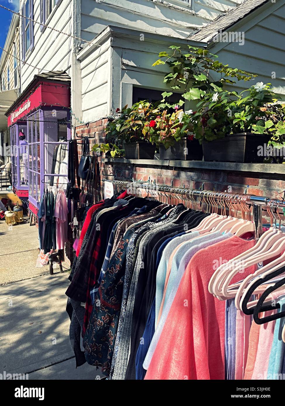 Racks of vintage clothing on display in cold Spring New York on its