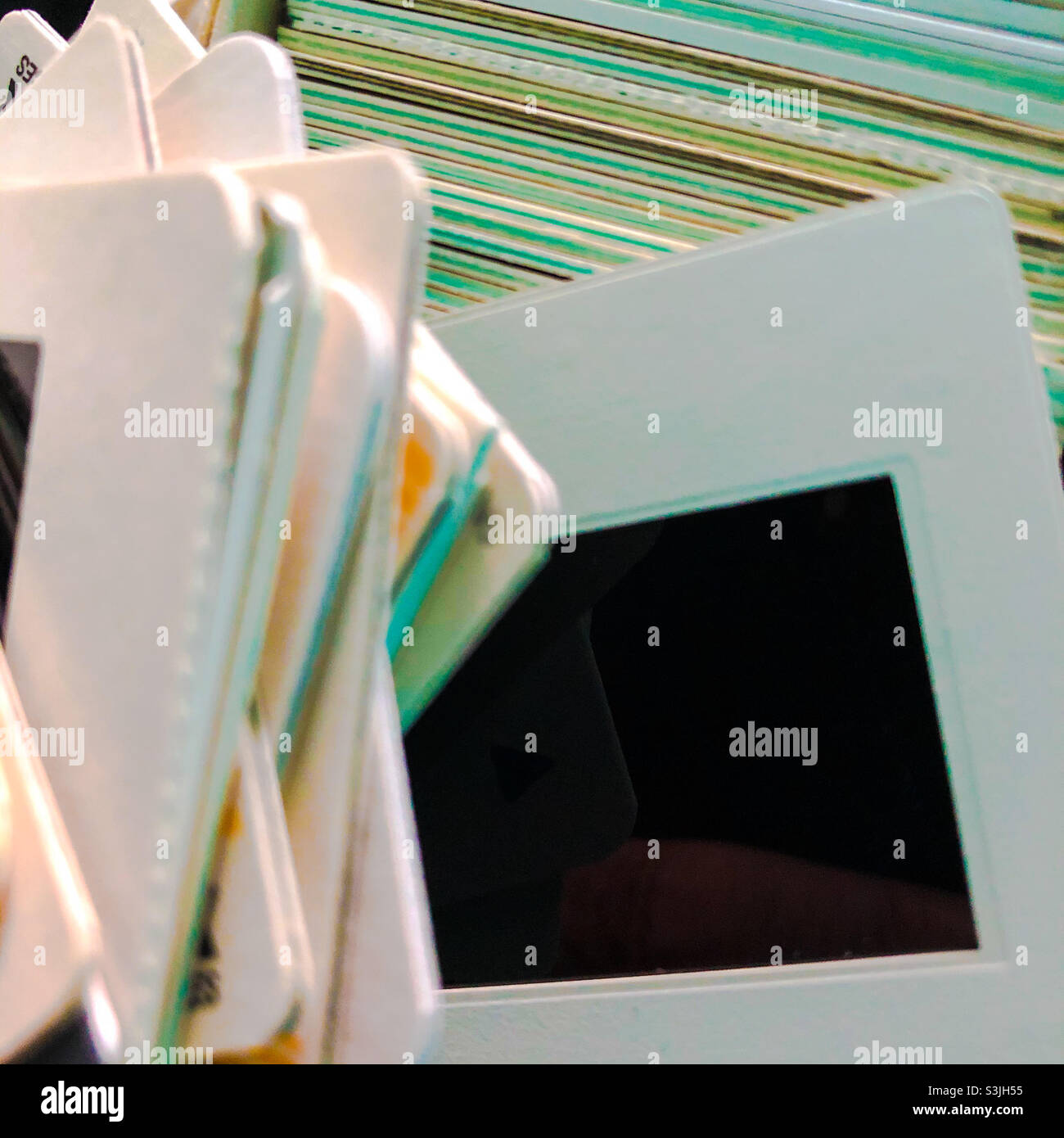 35mm Kodak slides ready to be edited and scanned to store online - Smartphone Captured Stock Image