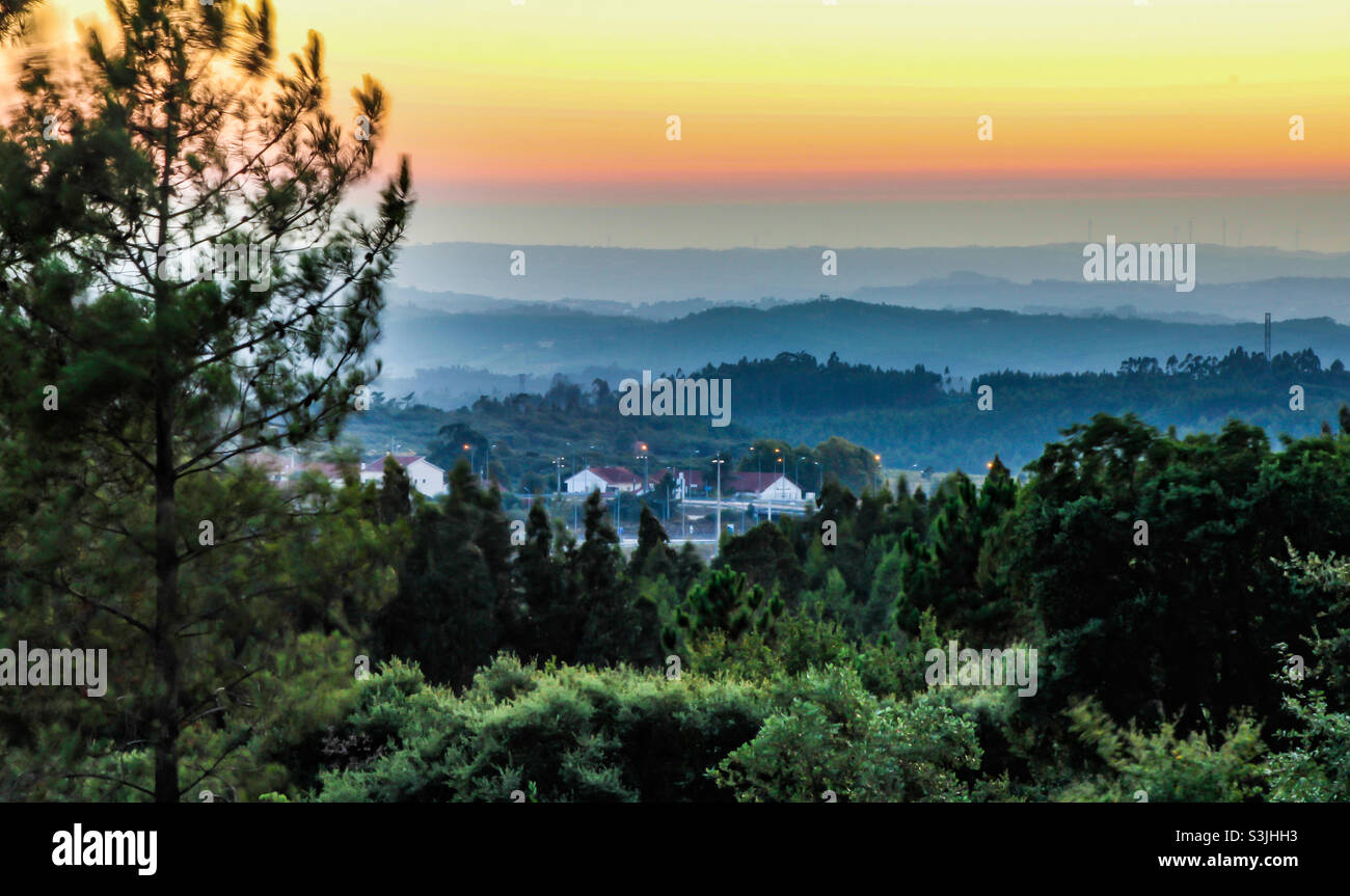 Autumn sunset across hills, trees and villages in Central Portugal - Smartphone Captured Stock Image
