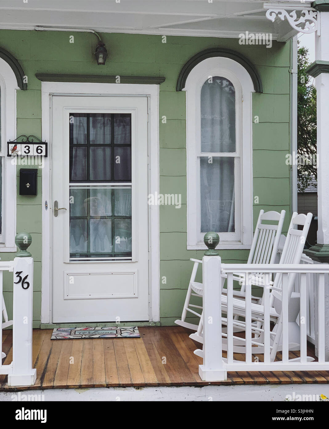 August, 2021, front porch and entrance to a home in Ocean Grove, Neptune Township, Monmouth County, New Jersey, United States - Smartphone Captured Stock Image