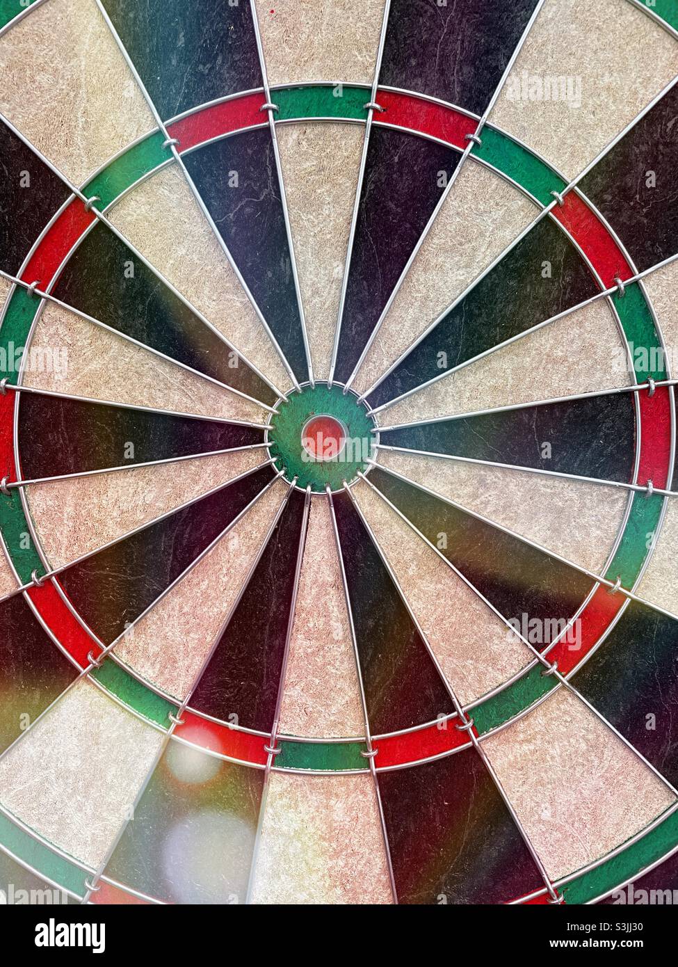 Close up of a colorful Franklin sports professional dartboard. - Smartphone Captured Stock Image