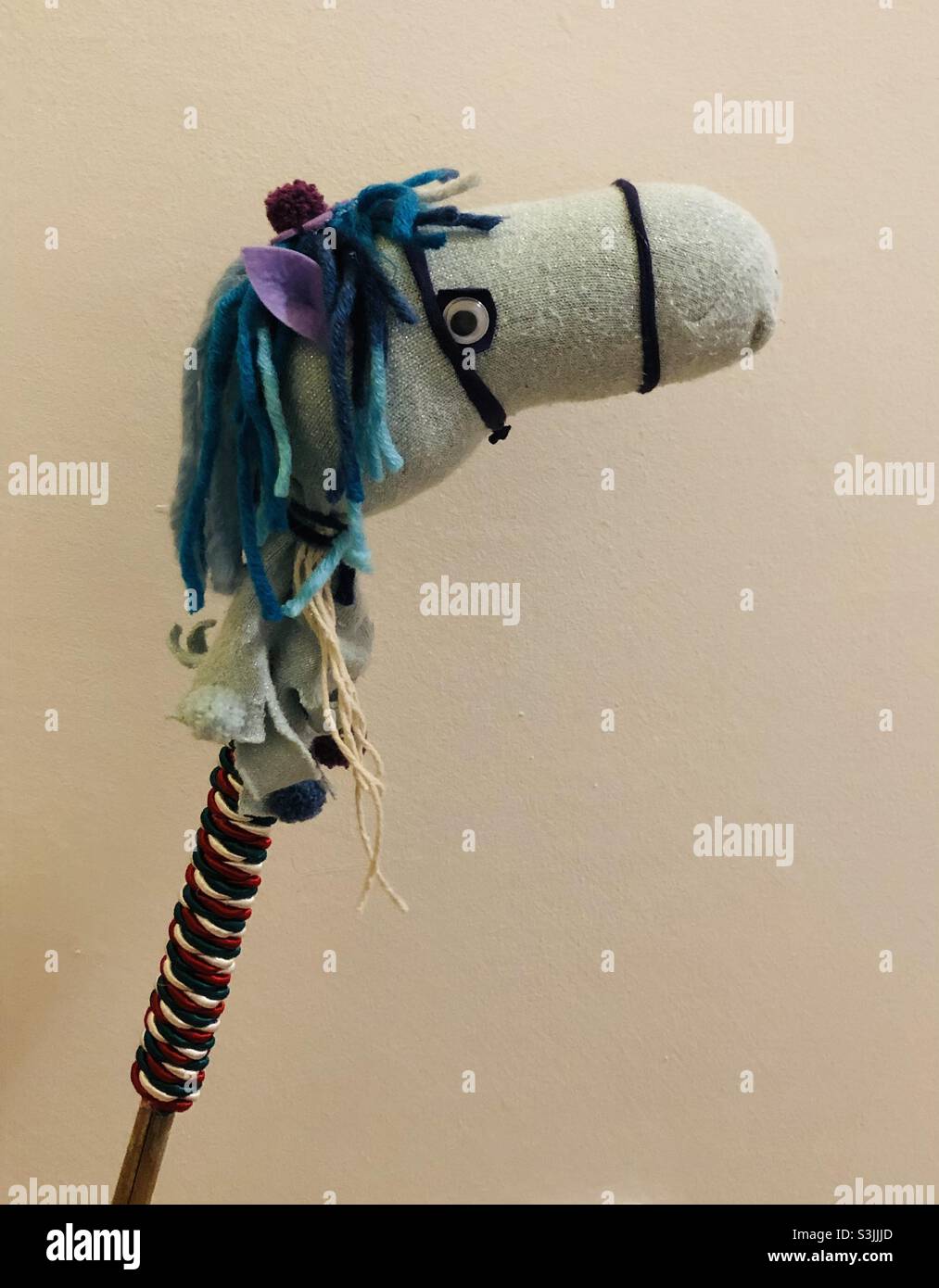 Horse made from sock with hungarian tricolor scarf Stock Photo Alamy