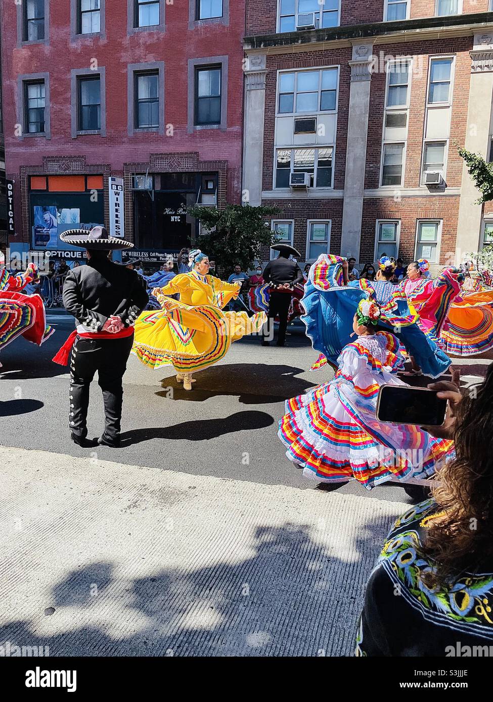 Traditional Mexican dancers in annual Mexican day parade October 2021 NYC, USA - Smartphone Captured Stock Image