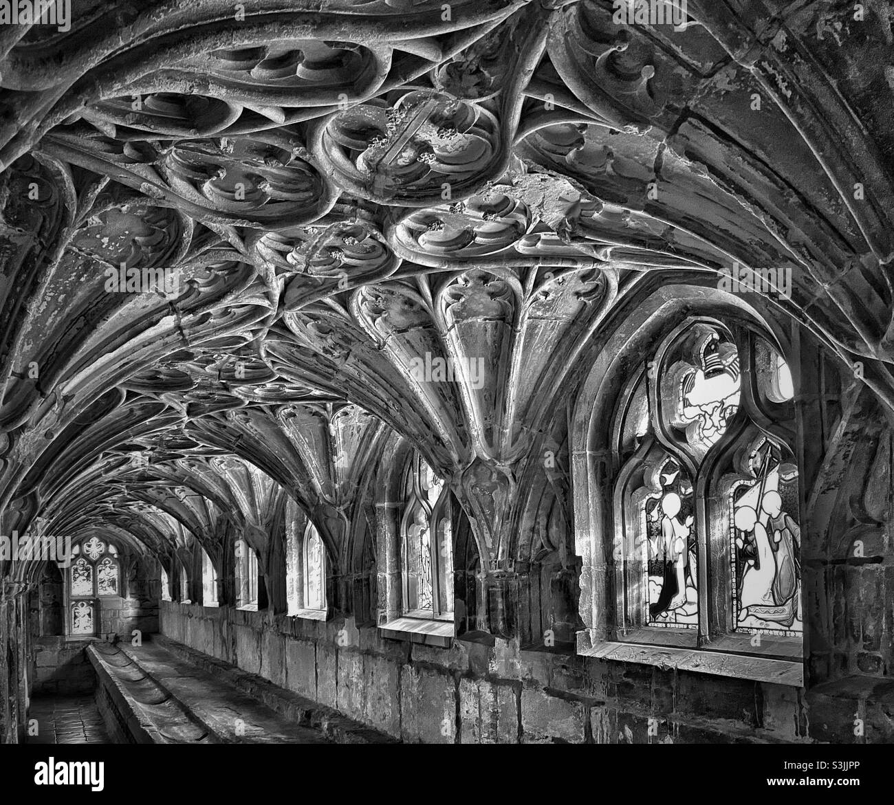 The lavatorium and sink area in the Cloisters of Gloucester Cathedral in the south of England. This area is famous for its fan vaulted ceilings & use in the Harry Potter movies. Photo ©️ COLIN HOSKINS - Smartphone Captured Stock Image