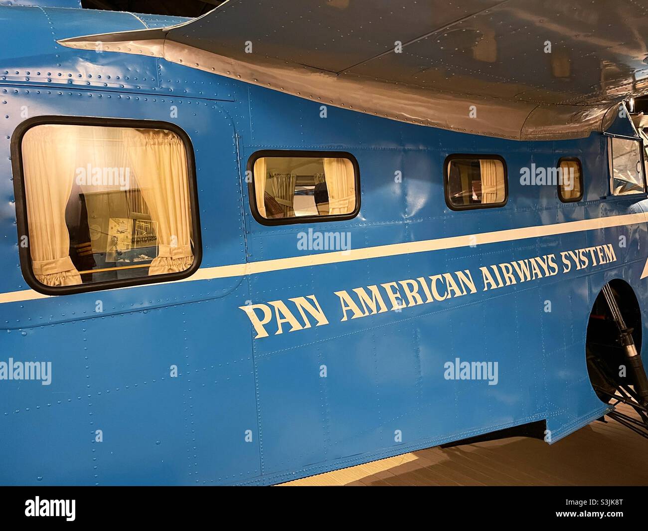 Cradle of aviation Museum has an early Pan-American airways system plane on display, Garden City Long Island, New York, 2021 - Smartphone Captured Stock Image