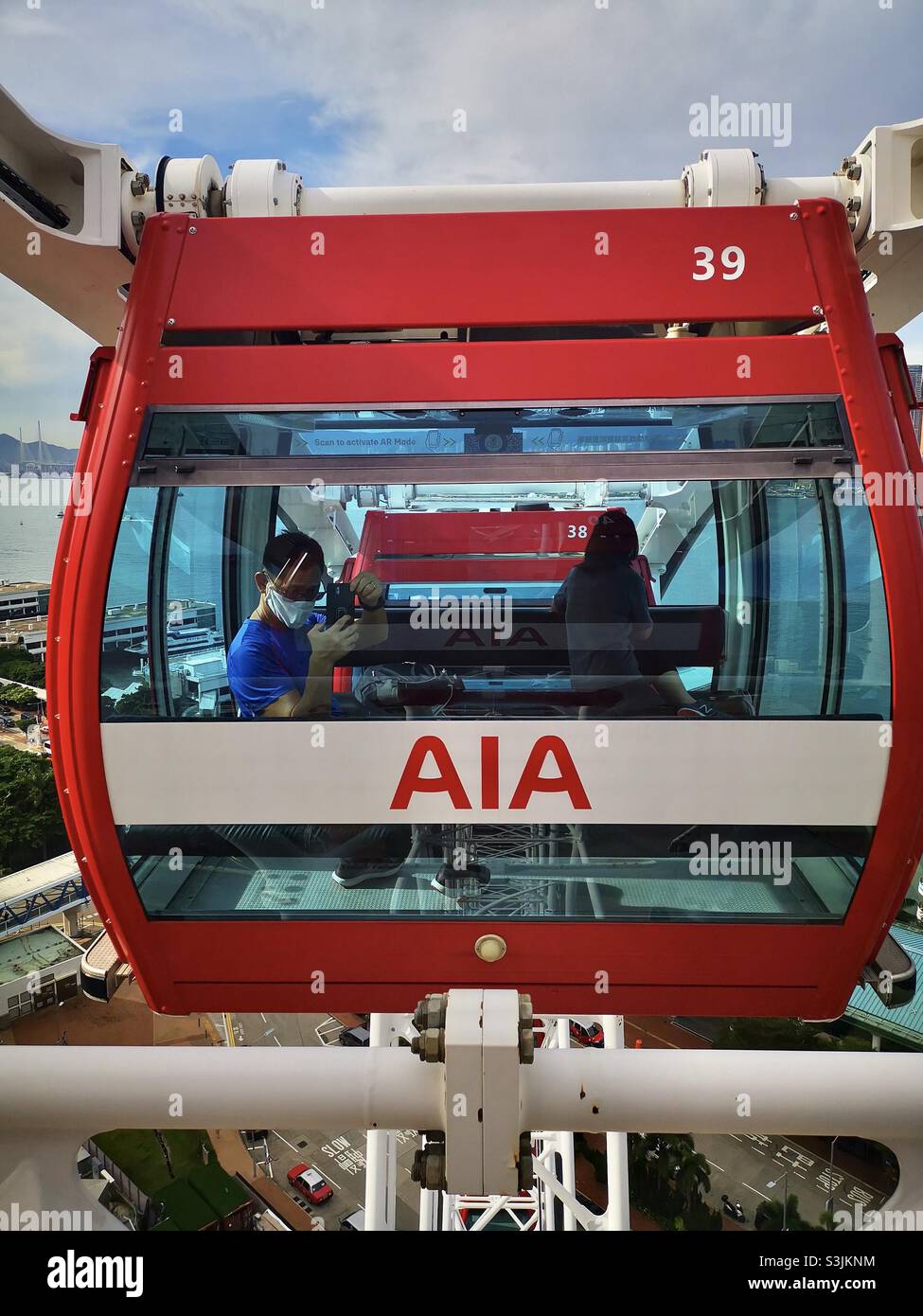 Riding the AIA Vitality Ferris wheel in Hong Kong Stock Photo - Alamy