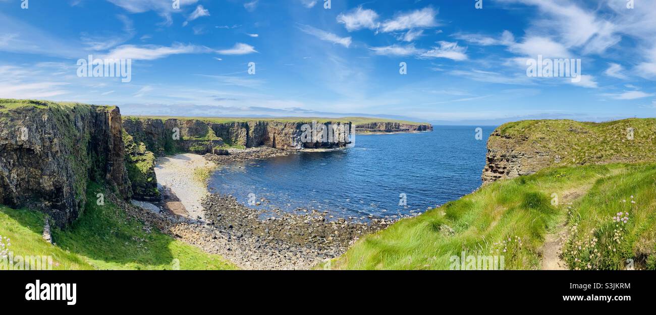 Coast and cliffs at Mull Head, Orkney. Panoramic Stock Photo