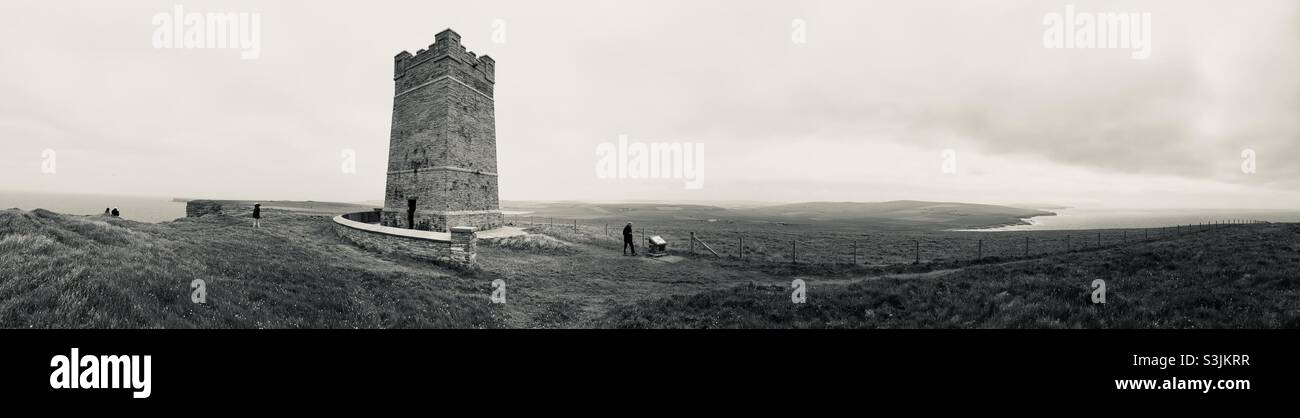 Black and white marwick head cliffs and Kitchener memorial. Orkney Stock Photo