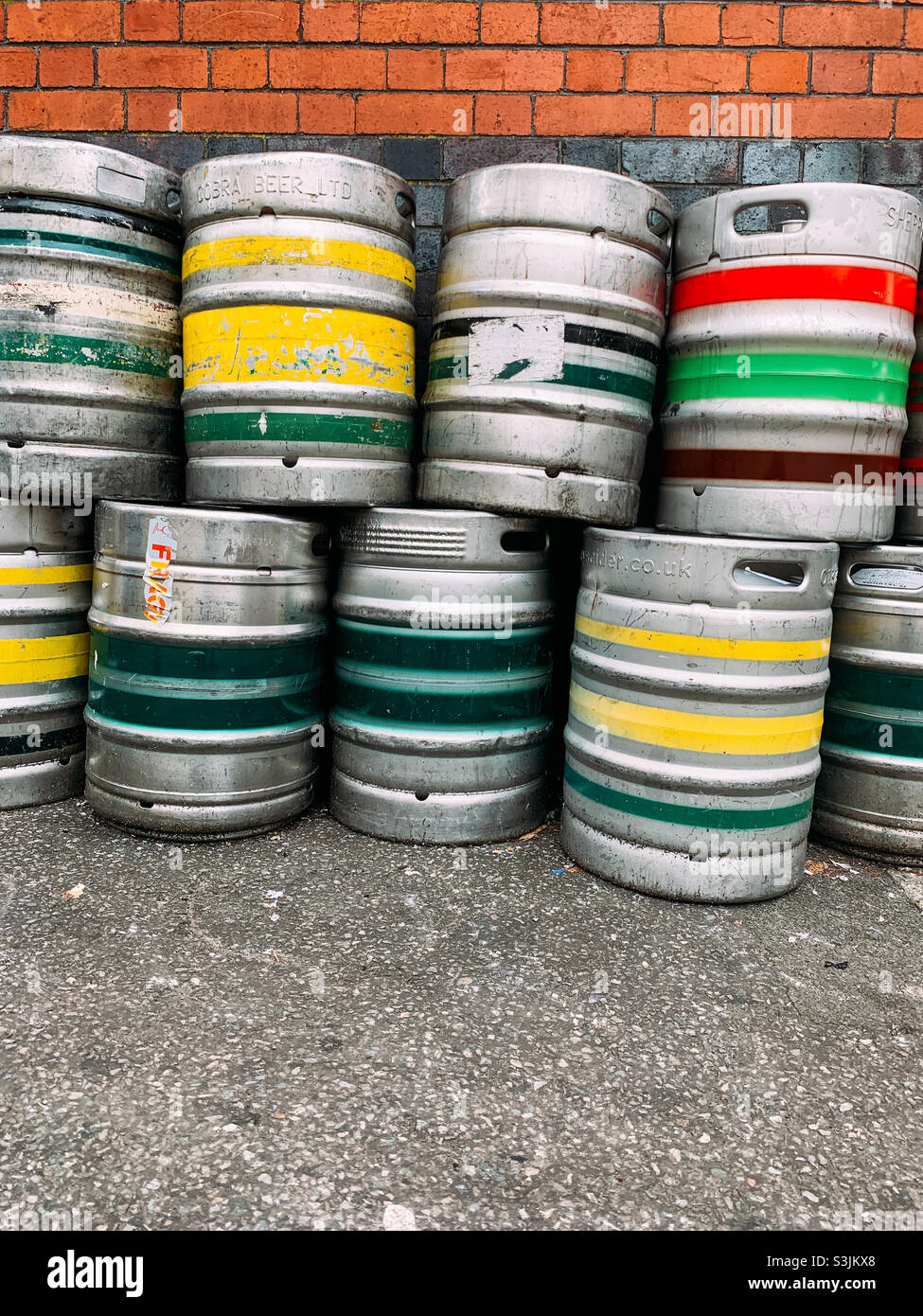 Empty aluminium beer barrels waiting for collection - Smartphone Captured Stock Image