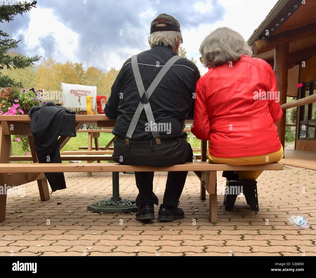 Couple having lunch on an outdoor patio Stock Photo Alamy