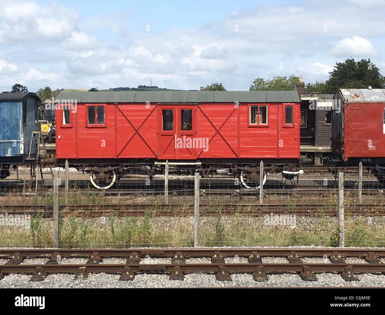 Red wooden train carriage - Smartphone Captured Stock Image