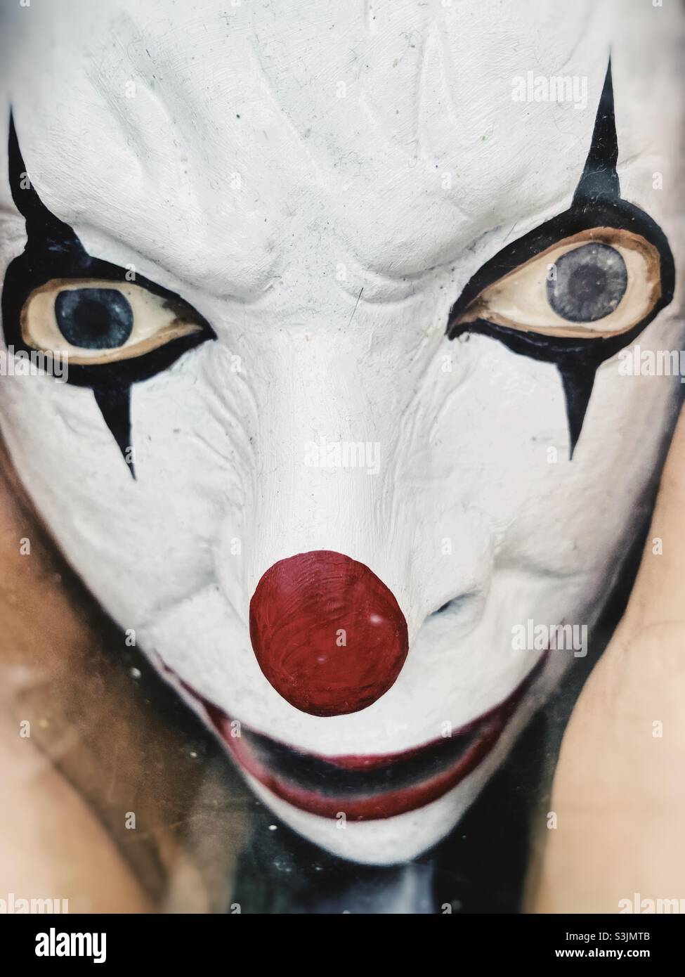 Halloween mask or face paint costume of a scary clown face Stock Photo