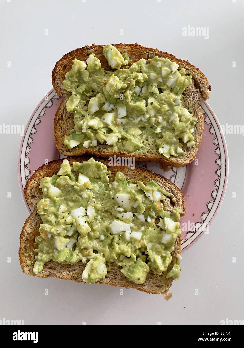 egg and avocado toast Stock Photo - Alamy