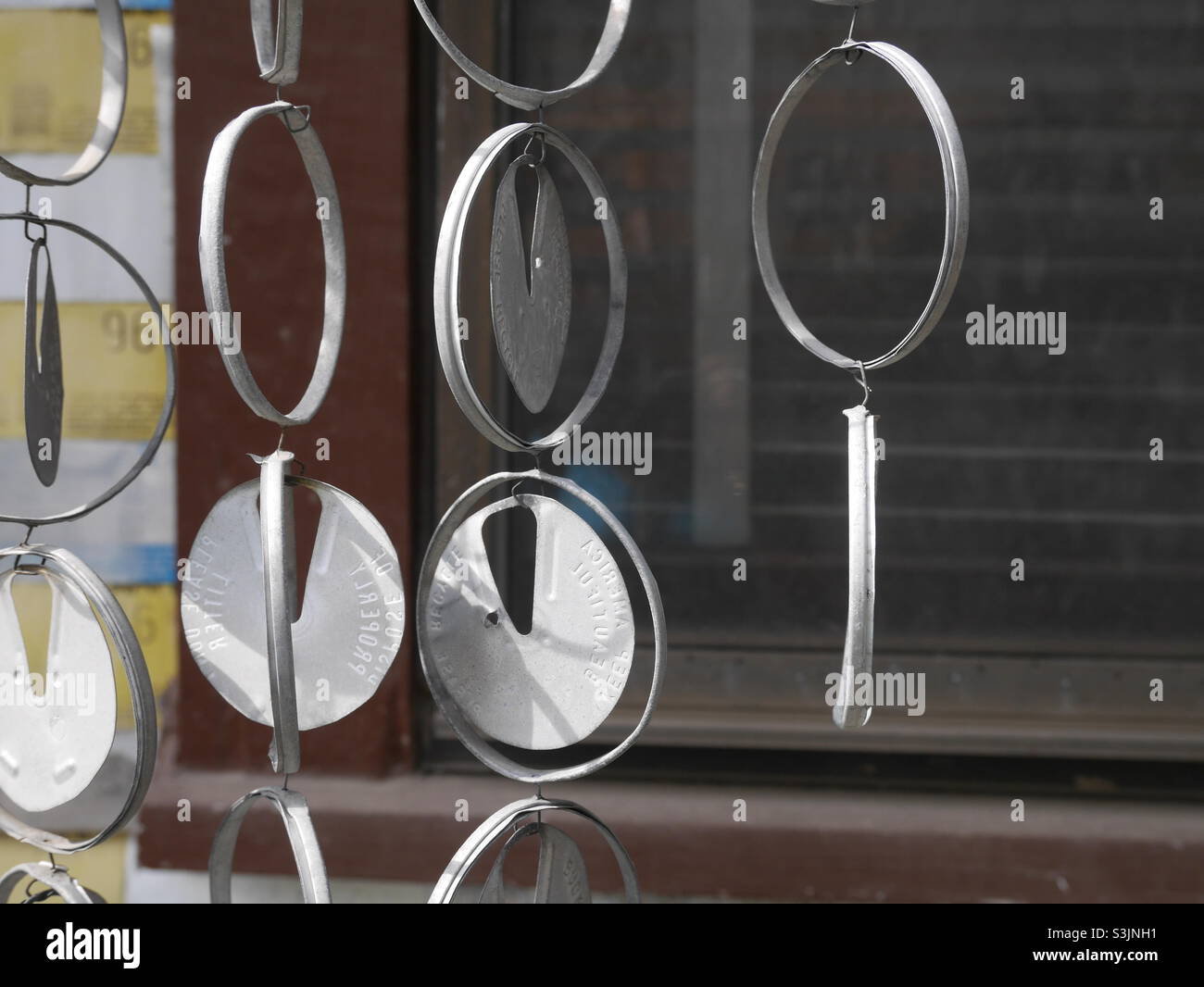 Wind chimes made of beer cans at Houston’s famous beer can house Stock Photo Alamy